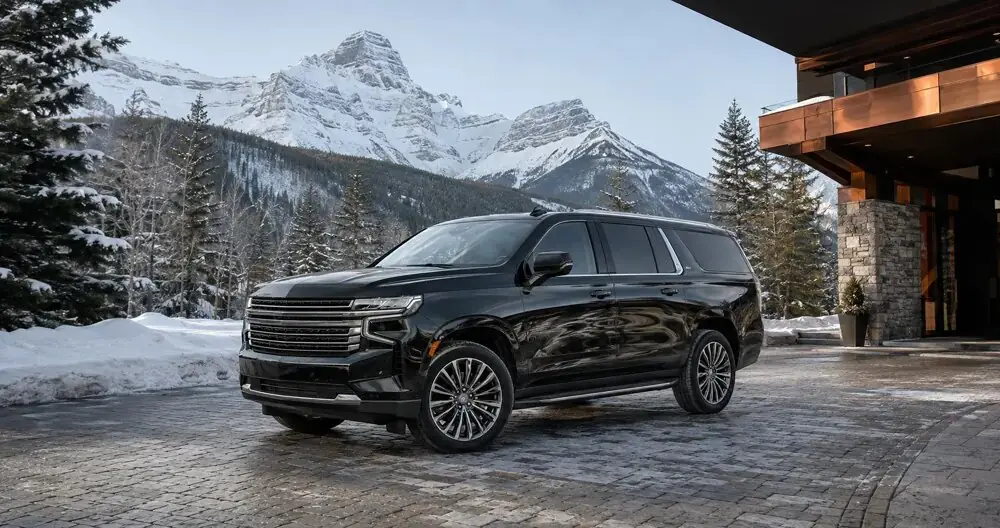 Black luxury SUV at a Canadian mountain resort